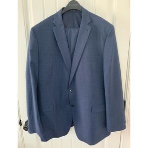 Calvin Klein suit. Jacket and pants. Never worn, only tried on. Size 50L.